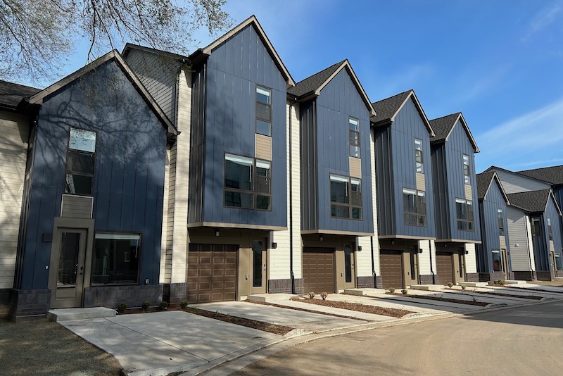 Blue and white James Hardie siding on a college dorm in northern Indiana