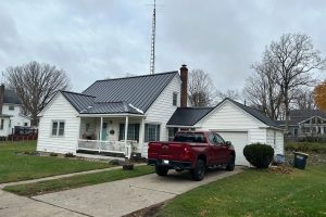 black standing seam metal roofing on a house in northern Indiana