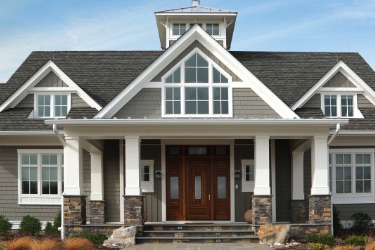 Gray and white house with Celect siding and front porch